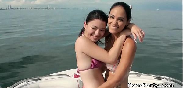  Sexy babes in bikinis partying on a boat